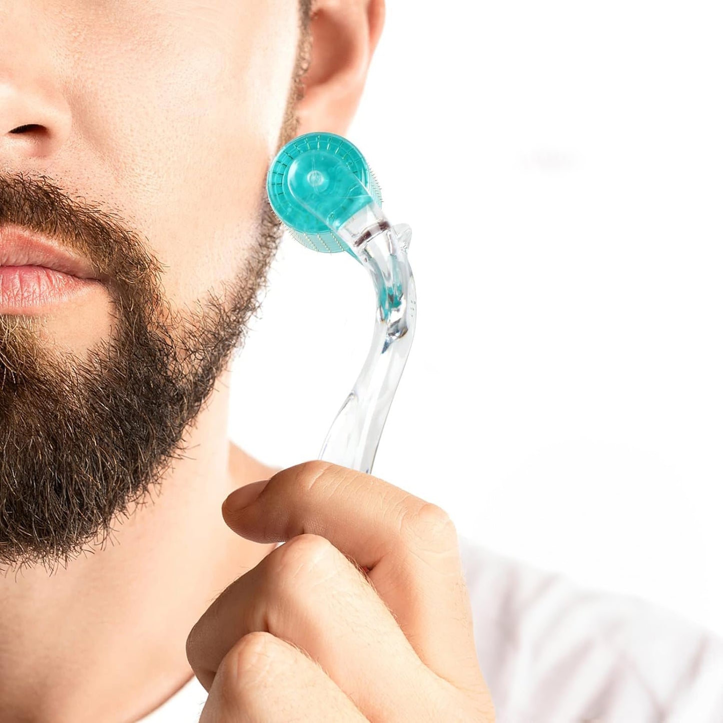 a male applying microneedling derma roller on face